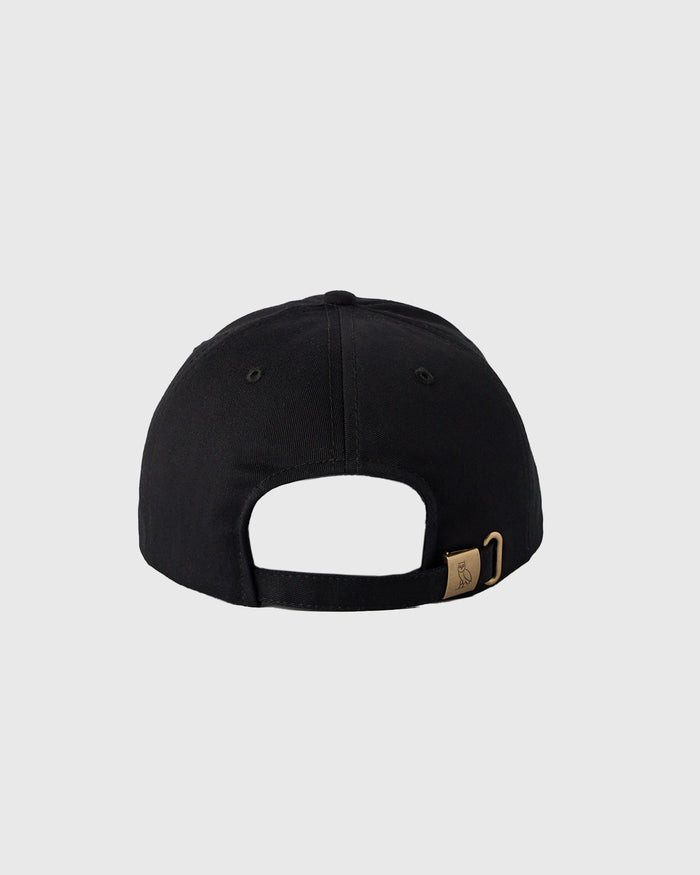 Black baseball cap with curved bill and tan adjustable back closure, shown from rear view.