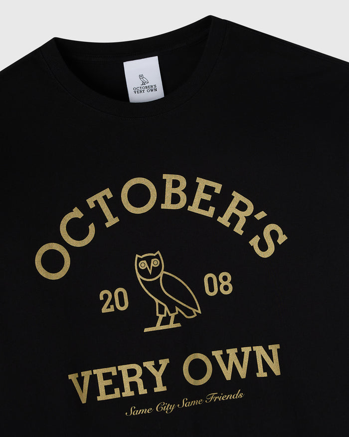 Black long-sleeve tee with gold "Octobers Very Own" text, owl graphic, and "2008" print on chest.