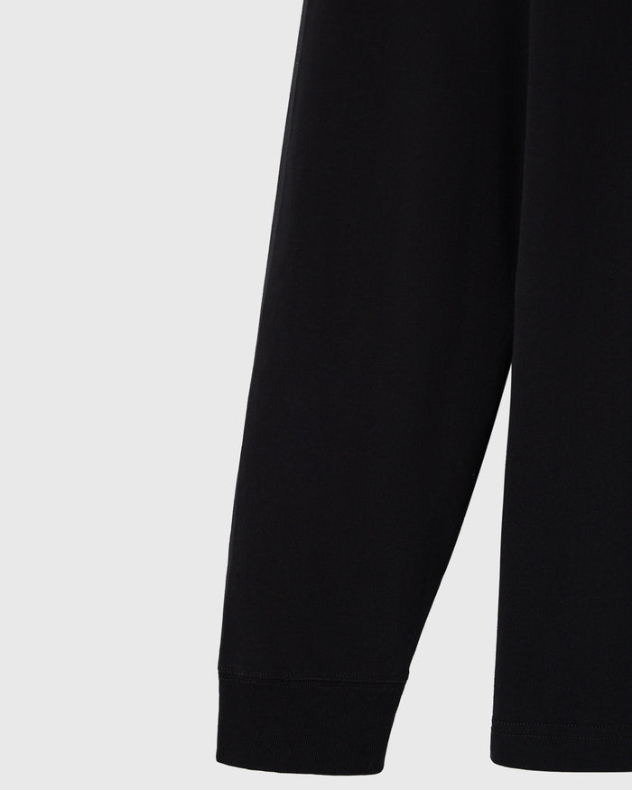 Black long-sleeve tee with ribbed cuffs at the wrists.