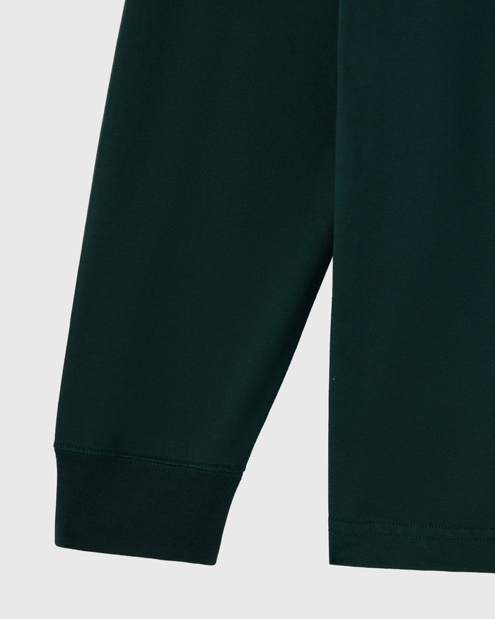 Midnight green long-sleeve tee with ribbed cuffs and hem detail.