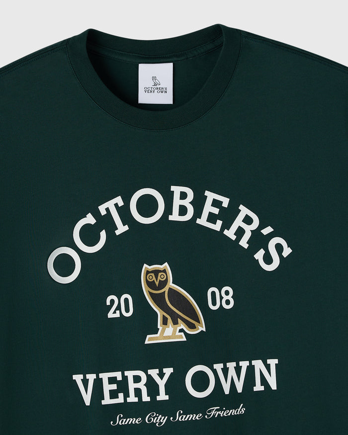 Midnight green crewneck tee with white "Octobers Very Own" text, owl graphic, and "2008" numerals.
