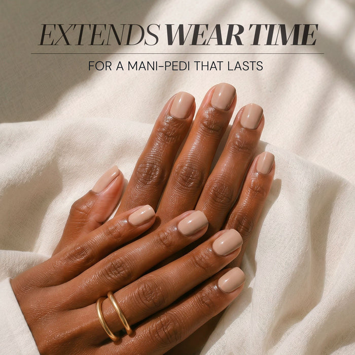 Close-up of hands with nude nails on white fabric, featuring text: "LONDONTOWN Full Service Base + Top Coat extends mani-pedi wear time—enjoy lasting results like using an all-in-one cleaning solution.
