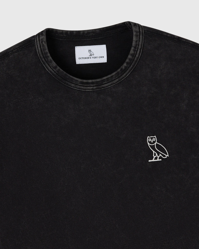 Black long-sleeve tee with crew neckline and white owl embroidery on chest.