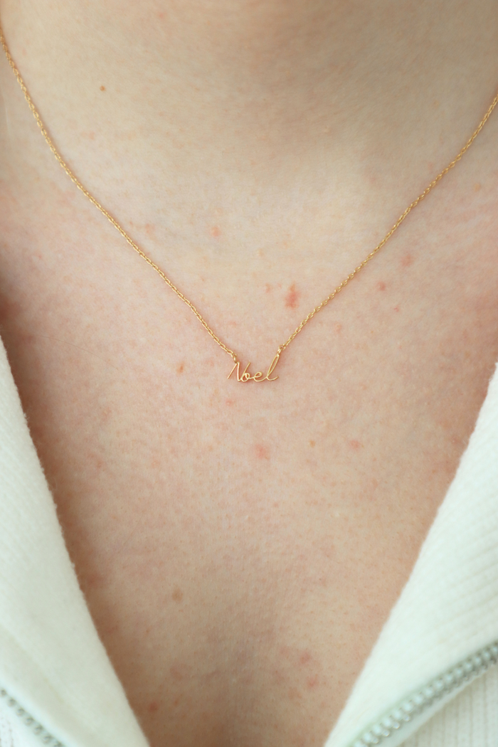 gold noel necklace