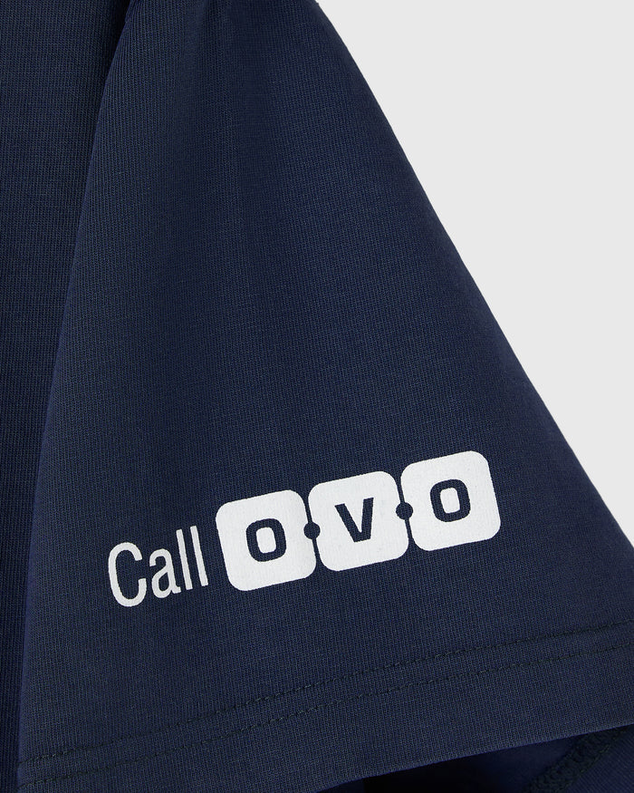 Navy ribbed t-shirt with white "Call OVO" graphic printed on chest.