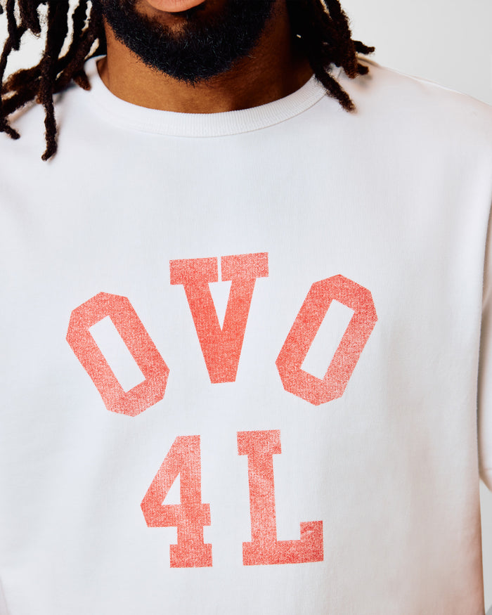 White crewneck tee with large red "OVO4L" text graphic on chest.