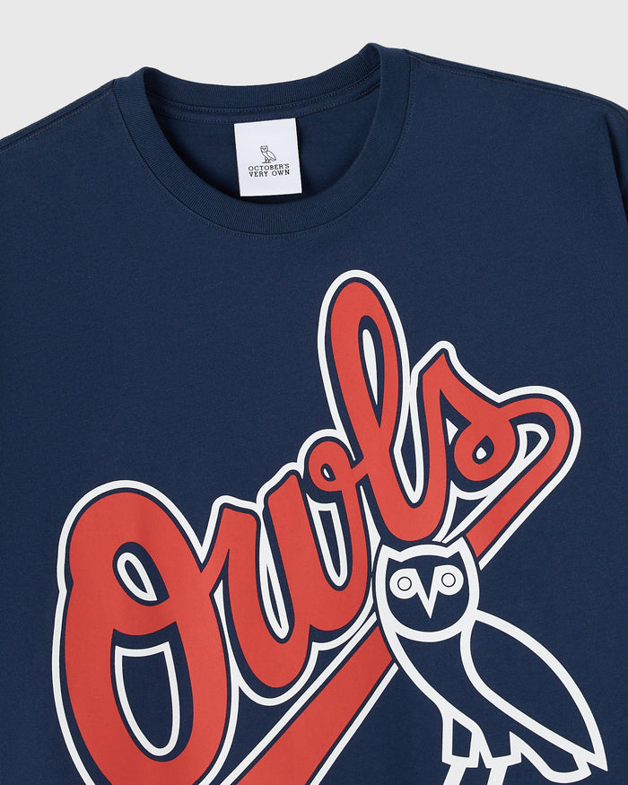 Navy t-shirt with red "Owls" text and white owl graphic on front, brand label visible at neckline.