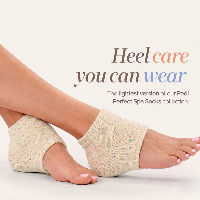 Close-up of feet in LONDONTOWN Pedi Perfect Lightweight Heel Socks with text: “Heel care you can wear”—the lightest socks from the Pedi Perfect line, featuring moisture-locking technology for effective heel therapy.