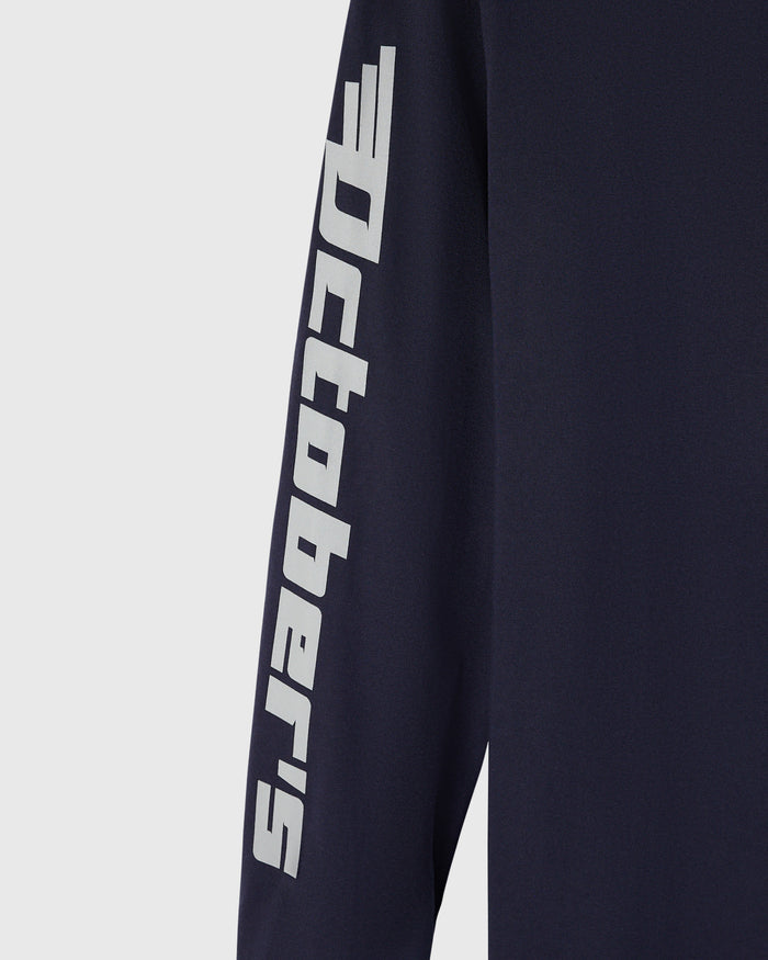 Navy long-sleeve tee with white Red Bull Racing logo and text printed down the sleeve.