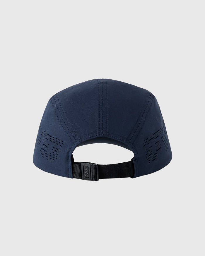 Midnight blue five-panel cap with perforated side panels and adjustable black strap closure.