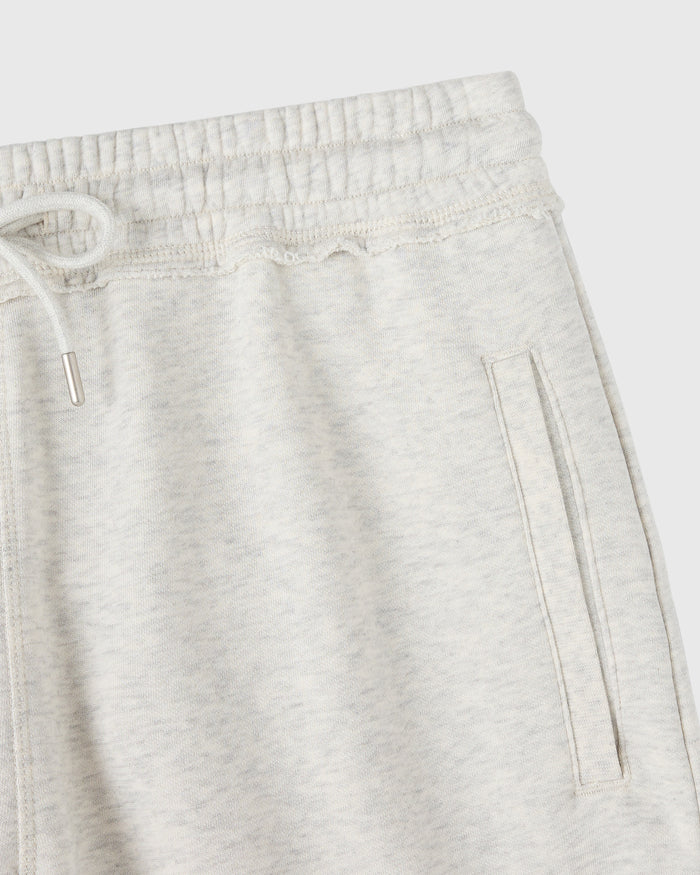 Heather grey sweatshort with elastic waistband, drawstring, and side pockets.