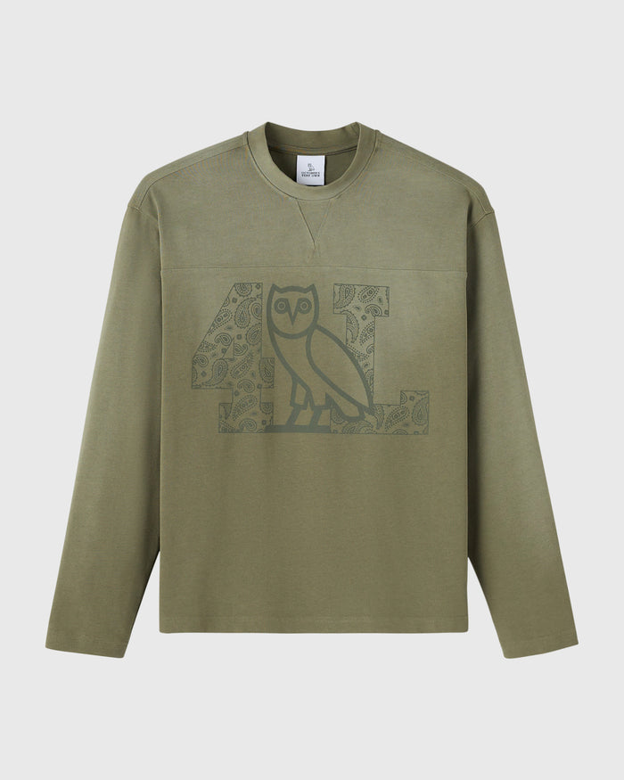 Olive green long-sleeve tee with owl graphic print on chest.