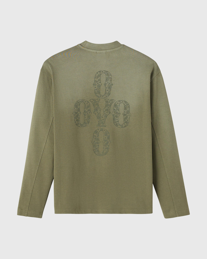 Olive green long-sleeve tee with decorative cross pattern printed on back.