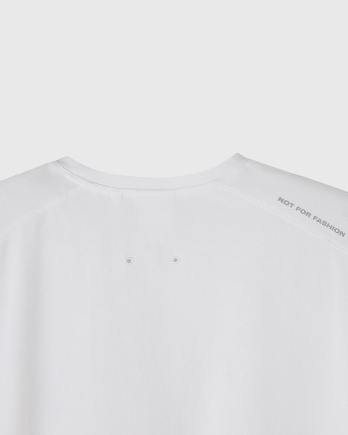 White short-sleeve crew neck tee with "NOT FOR FASHION" text on back shoulder.