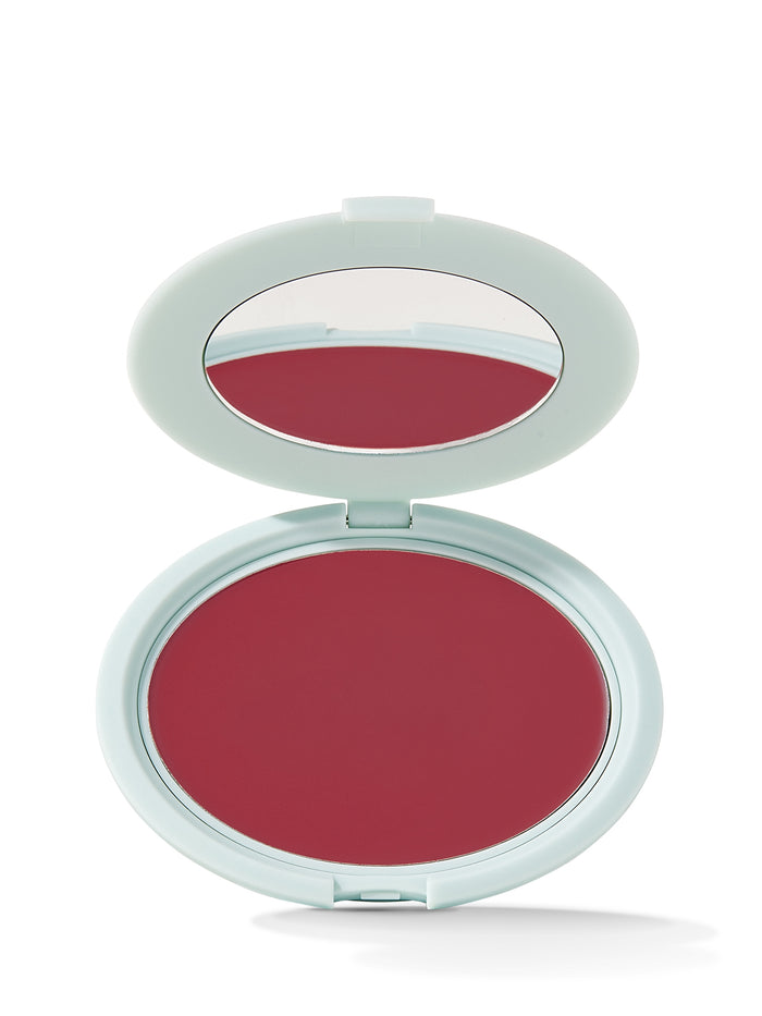 Compact blush in a white case on a white background