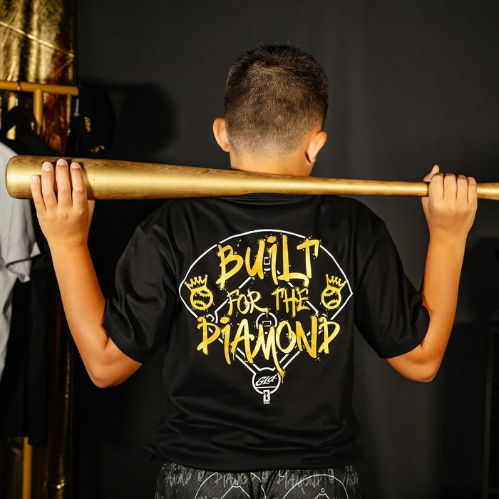 Youth model wearing black youth graphic tee with "Built For The Diamond" design