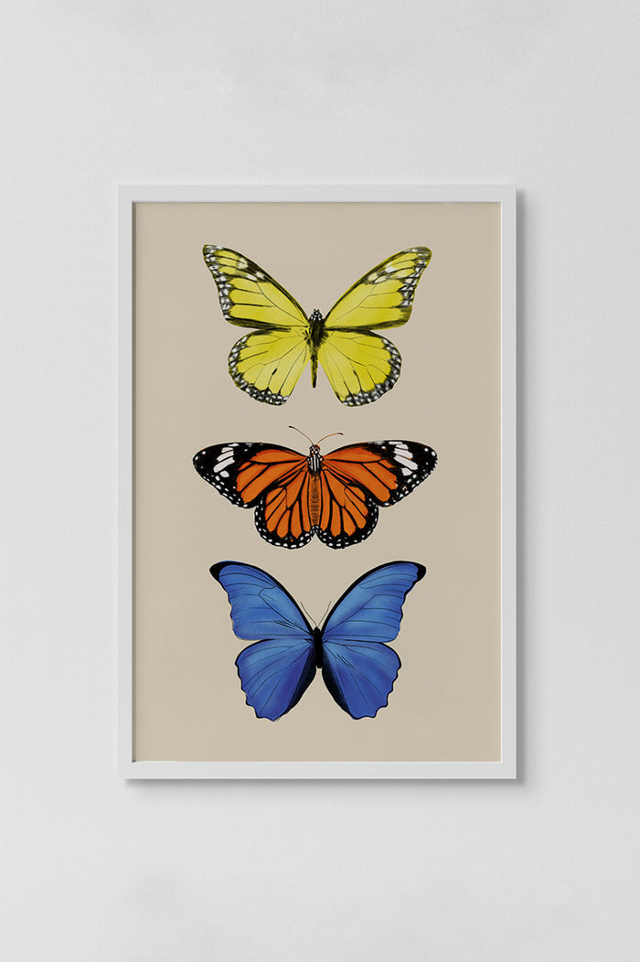 three butterflies with yellow, orange, and then blue in a vertical line