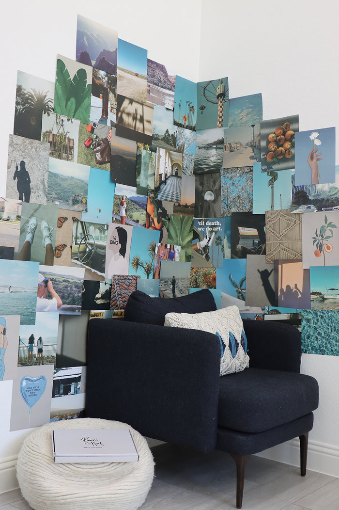 Wall with multicolor photos and graphic design prints in blue teal and green hues themed around california