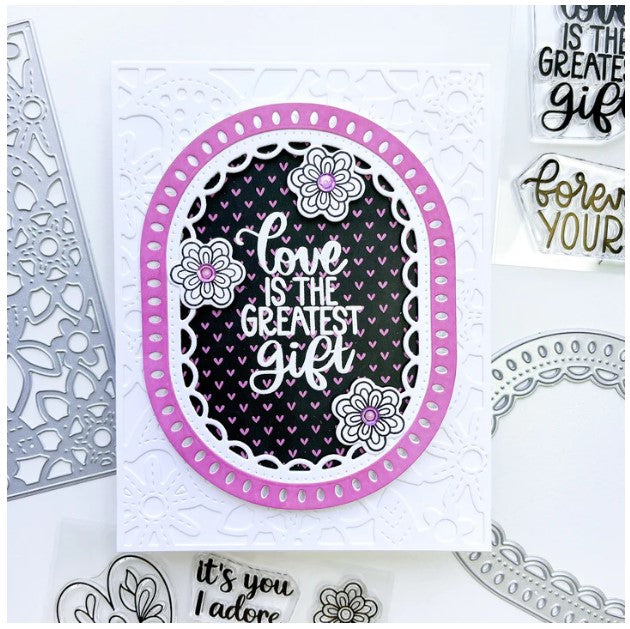 Catherine Pooler - Dies - Fancy Loop. The Fancy Loop Die is a beautiful scalloped frame die. This straight sided oval or "loop" die is a great shape for a standard A2 card front as a feature frame or popped up element. Available at Embellish Away located in Bowmanville Ontario Canada. Example by brand ambassador.