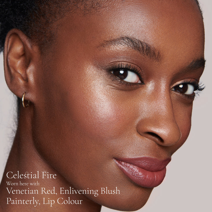 Lisa Eldridge Elevated Glow Highlighter in shade Celestial Fire pictured on model