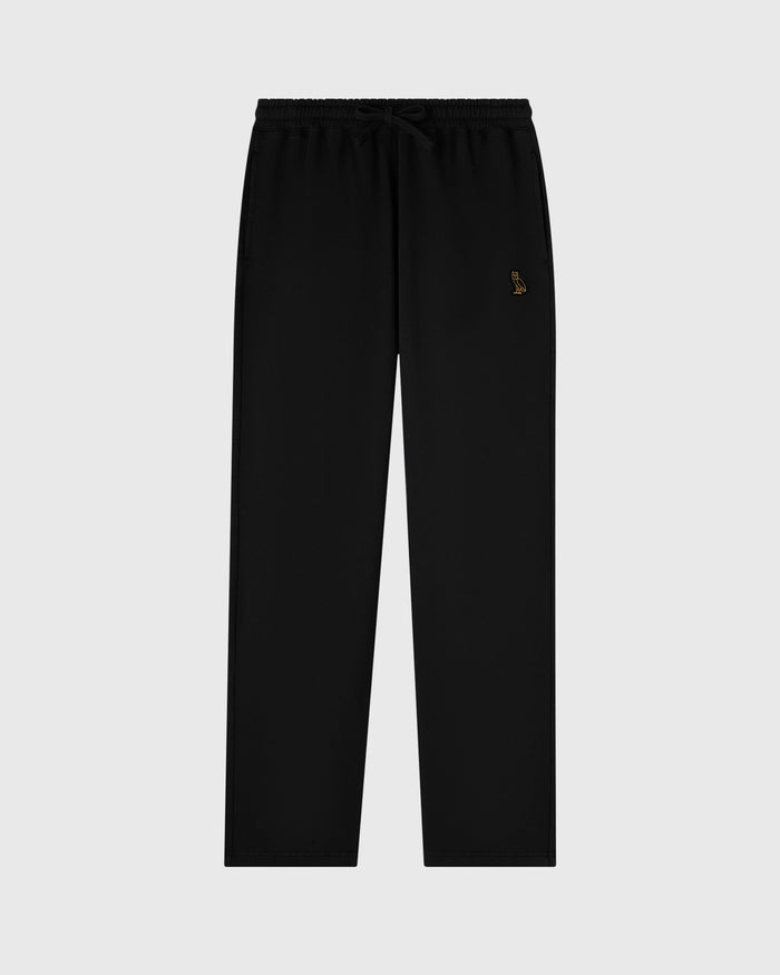Black sweatpants with drawstring waist, open hems, and small embroidered logo on thigh.