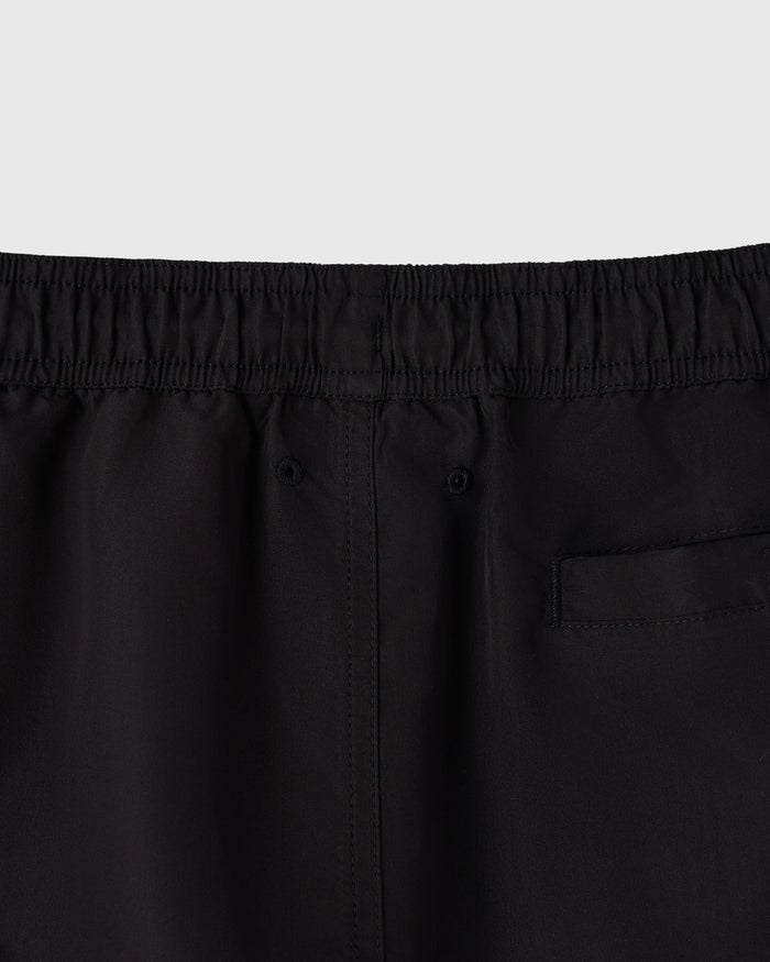 Black swim shorts with elastic waistband and back pocket detail.