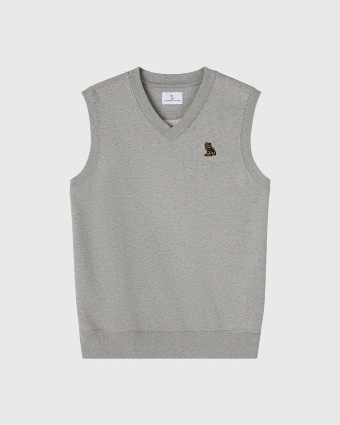 Heather grey sleeveless vest with V-neckline and small embroidered owl logo on chest.