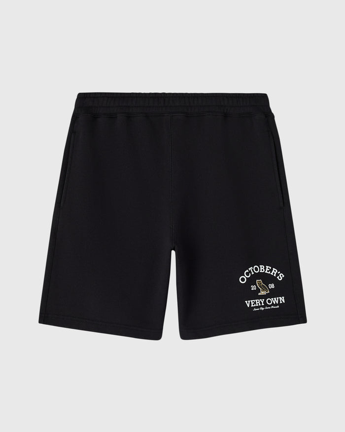 Black shorts with elastic waistband and "October's Very Own" graphic print on right leg.