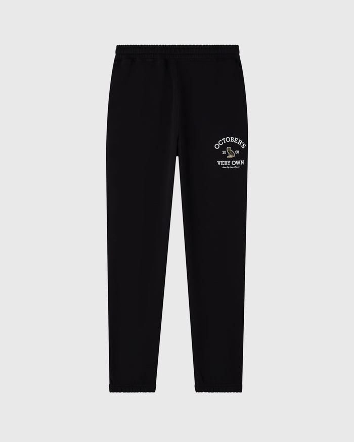 Black sweatpants with "Octobers Very Own" text and graphic printed on thigh.