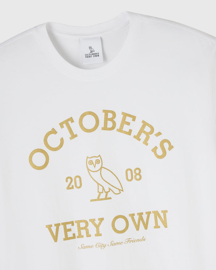 White crew neck t-shirt with gold "Octobers Very Own" text and owl graphic with "2008" underneath.