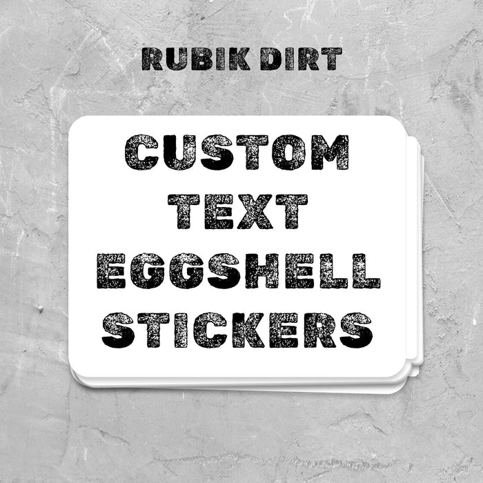 Stack of custom text eggshell stickers on a textured gray background with 'Rubik Dirt' branding.
