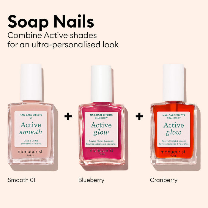 Three bottles of Manucurist nail polish, labeled Active Smooth, Active Glow Blueberry, and Active™ Glow Cranberry, are displayed side by side with plus signs between them under the heading Soap Nails. These plant-based nail essentials from Manucurist deliver tinted glow nails, blending natural ingredients with vibrant color for a healthy, polished look.