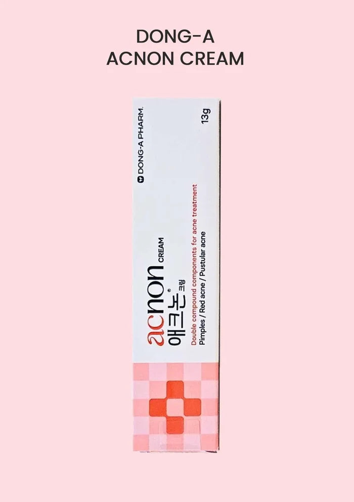 Dong-A Acnon Cream packaging on a pink background