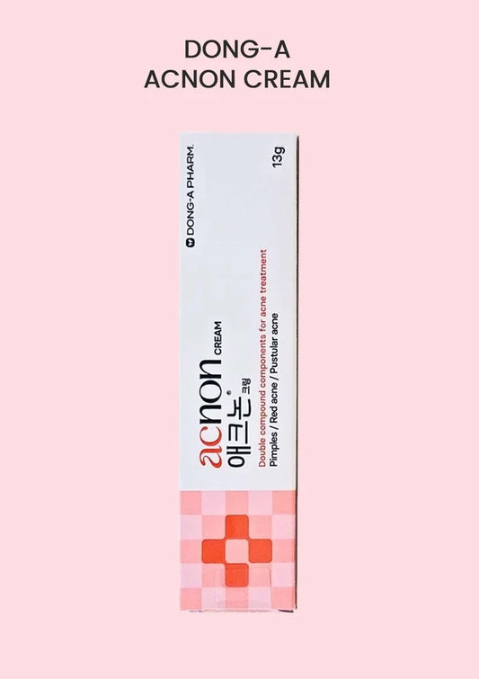 Dong-A Acnon Cream packaging on a pink background