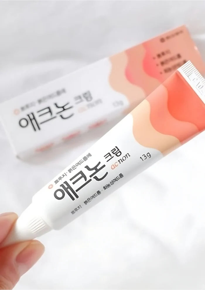 Two tubes of 'Aekyung' cream on a white background