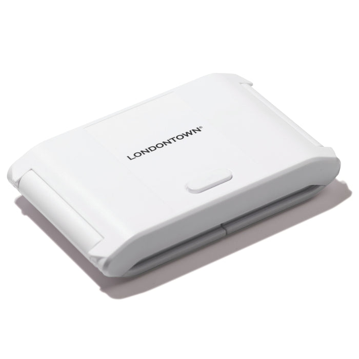 The LONDONTOWN Foldable UV/LED Gel Lamp is a white, rectangular device with rounded edges and a central button—designed for travel-friendly, fast gel curing.
