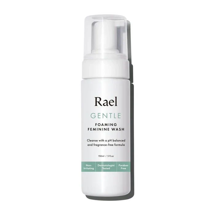 A pump bottle of Rael Gentle Foaming Feminine Wash with product information and branding visible.