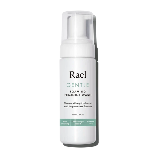 A pump bottle of Rael Gentle Foaming Feminine Wash with product information and branding visible.