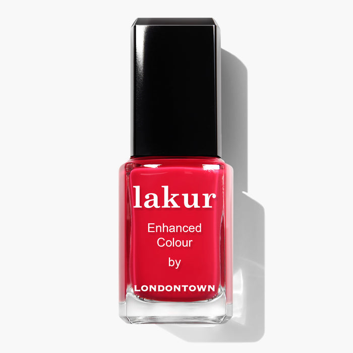 A bottle of LONDONTOWN Guilty Pleasure Lakur Enhanced Colour nail polish in vibrant red, proudly vegan and cruelty-free.