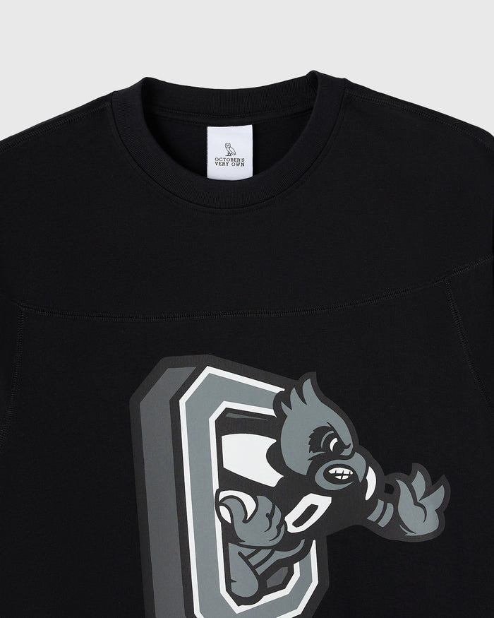 Black heavyweight t-shirt with gray and white mascot football logo on chest.