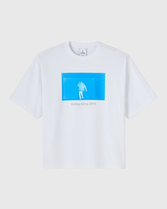 White t-shirt with blue rectangular graphic featuring a figure silhouette and "Hotline Bling 2016" text.