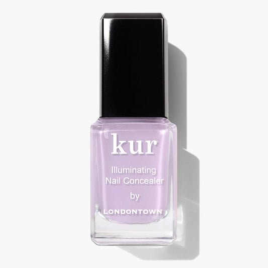 A bottle of LONDONTOWN Lavender Illuminating Nail Concealer, a light lavender polish with a perfecting formula, shown against a white background.