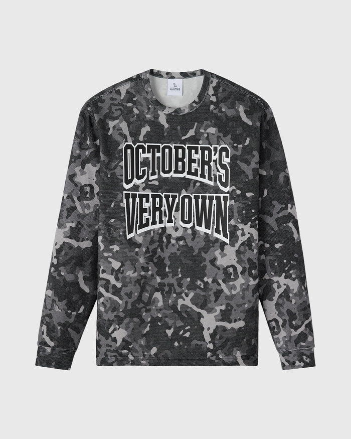 Grey camouflage long-sleeve tee with white "October's Very Own" text graphic on chest.