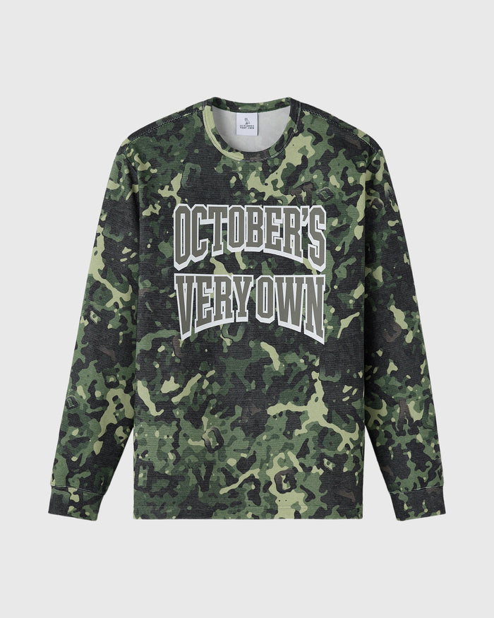 Long-sleeve tee in green and black camouflage print with white "October's Very Own" text across chest.