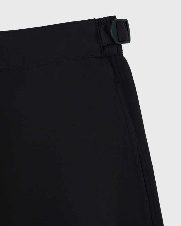 Black swim shorts with elasticated waistband and side buckle closure detail.