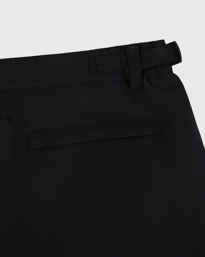 Black swim shorts with elastic waistband, drawstring, and front patch pocket detail.