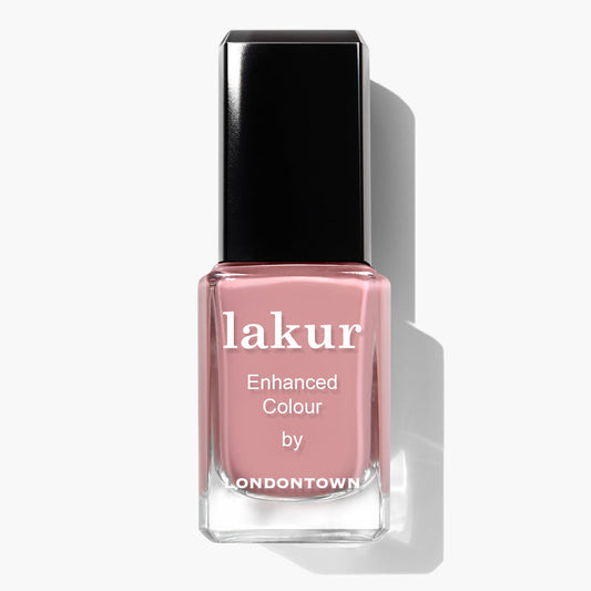 A bottle of LONDONTOWN Lakur Enhanced Colour nail polish in the shade Mauve Over, a soft crème dusty rose hue that is vegan and cruelty-free, shown against a white background.