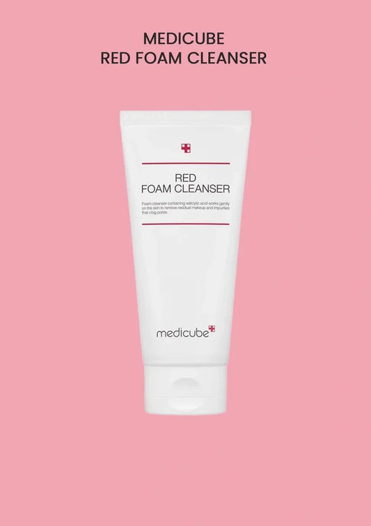 Medicube Red Foam Cleanser tube on a pink background