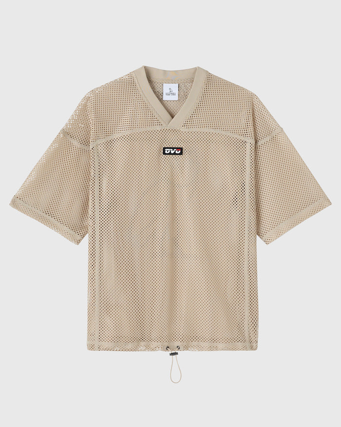Sandstone mesh football jersey with V-neck, short sleeves, small black logo on chest, and drawstring hem.