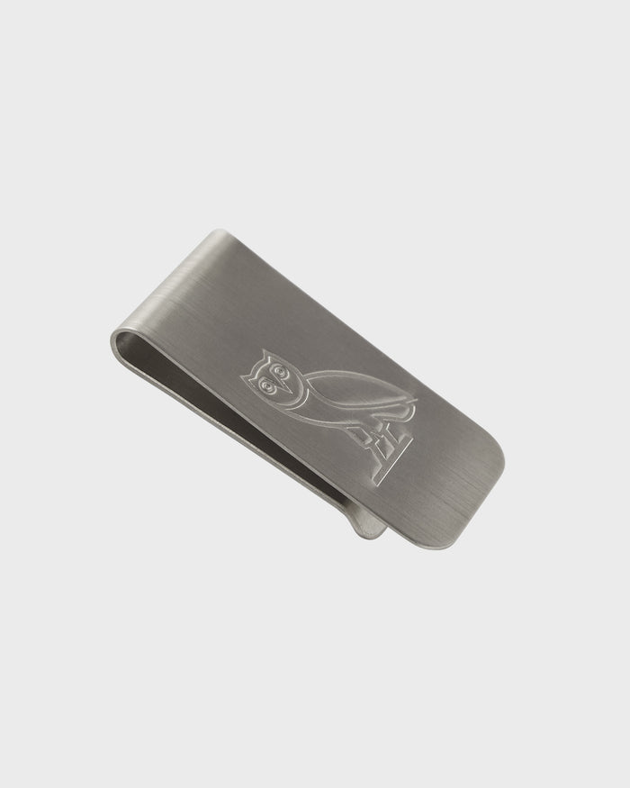 Silver money clip with engraved owl design and brushed metal finish.